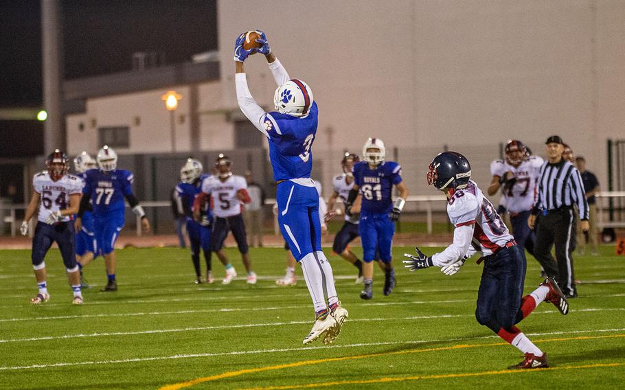 Naser Eaves of Ramstein intercepts a pass during the DODEA-Europe Division I football championship game between the Ramstein Royals and the Lakenheath Lancers, Saturday, Nov. 3, 2018. 
