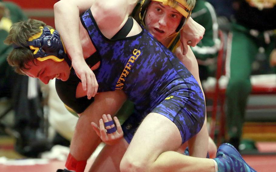 Yokota's Cameron Ewens and Edgren's Bradleigh McCollum fight for control at 168 pounds.