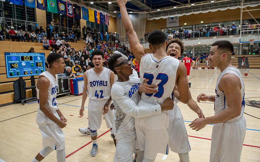 Ramstein players celebrate after beating Kaiserslautern 48-39 in the 2019 Division I basketball championship game at Clay Kaserne Fitness Center, Germany, Saturday, Feb. 23, 2019. 