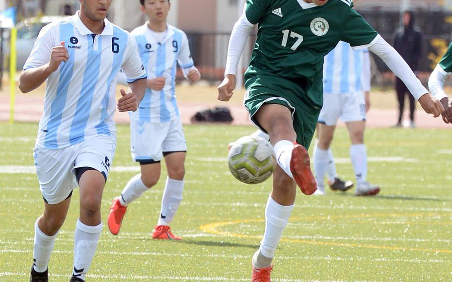 Kubasaki's Alexis Ayala boots the ball past Chadwick's Gibran Khalil.