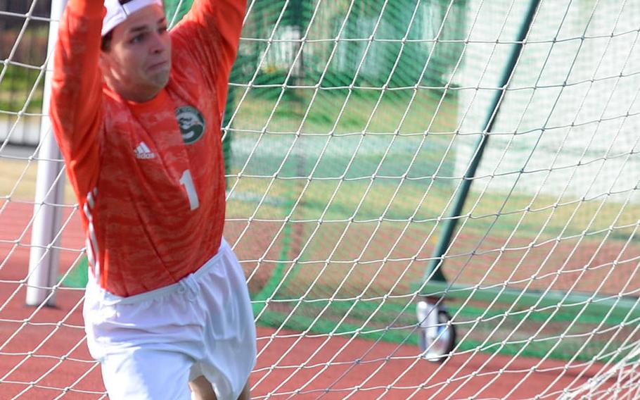 Kubasaki keeper Cameron Oliver draws a bead on a Chadwick penalty-shootout attempt.