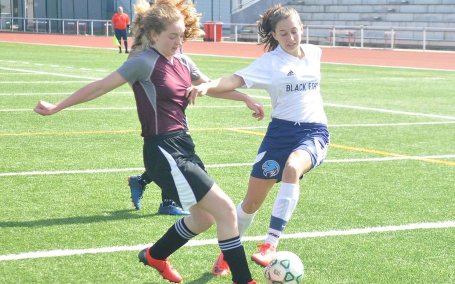 Black Forest Academy's Becca Losey and AFNORTH's Stella Gage compete for a ball Saturday, April 6, 2019, at Kaiserslautern High School. Black Forest earned a 6-0 shutout victory. 
