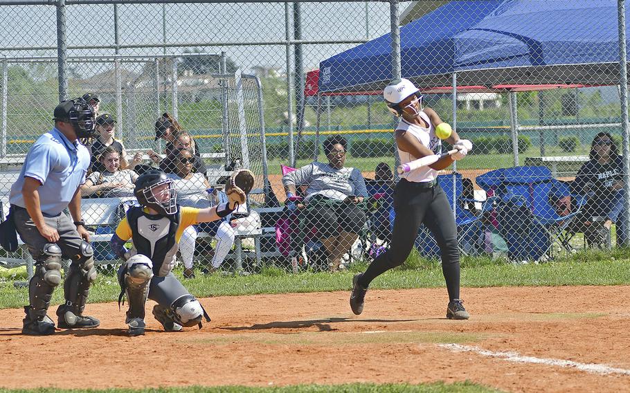 Naples' Mia Rawlins delivers a deep hit that scored a few runs during the game between Naples and Wiesbaden that took place Saturday, April 20, 2019, at Caserma Del Din, in Vicenza. Naples ended up winning the game 9-3. 
