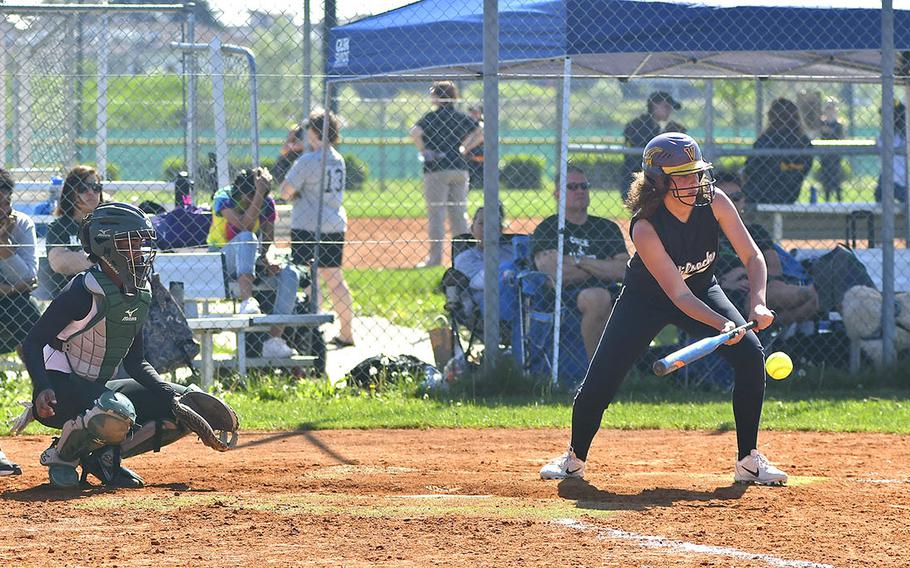 Cecelia Jackson, a center fielder from Vilseck, hits a low pitch during the game between Vilseck and Naples that took place Saturday, April 20, 2019, at Caserma Del Din, in Vicenza. Vilseck ended up loosing the game 9-13.  