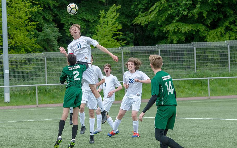 Brussels' Troy Erwin goes up for a header during a game against Alconbury on the third day of the DODEA-Europe soccer championships, Wednesday, May 22, 2019.
