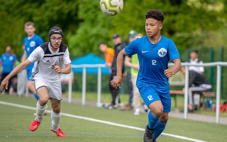 Ramstein's Gabriel Delanoy take the ball down the sideline during a Division I semifinal game against SHAPE on the third day of the DODEA-Europe soccer championships, Wednesday, May 22, 2019.