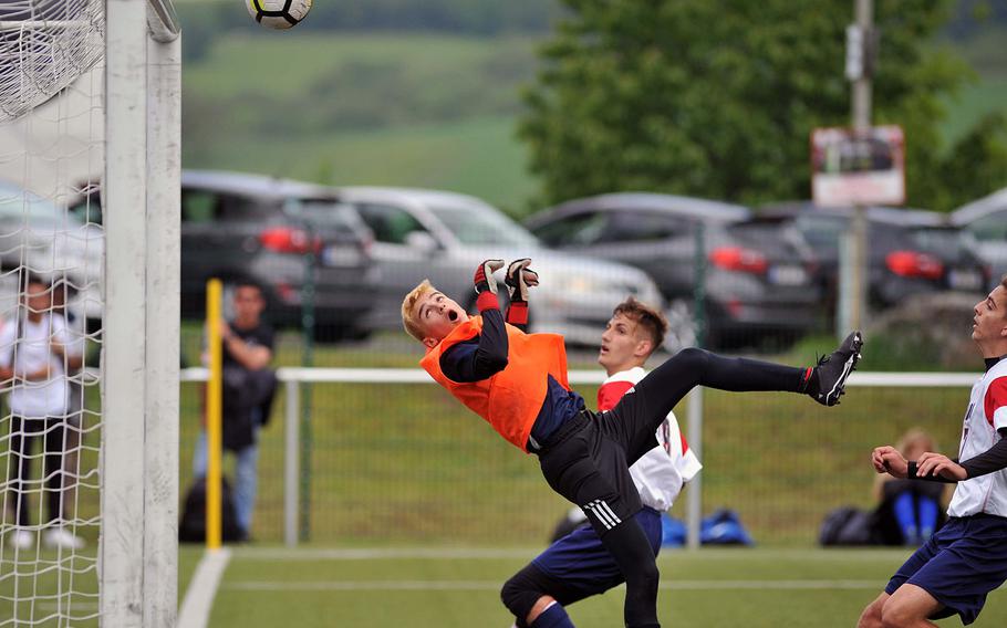 Florence keeper Lorenzo Budroni watches his save of an Aviano shot bounce off the crossbar in a Division II semifinal in Reichenbach, Wednesday, May 22, 2019. Aviano won the game 1-0 and will face AOSR in Thursday's final.