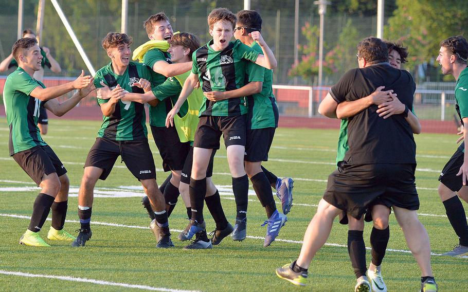 The Naples Wildcats celebrate the boys Division I title after defeating Ramstein 1-0 in the championship game in Kaiserslautern, Thursday May 23, 2019.
