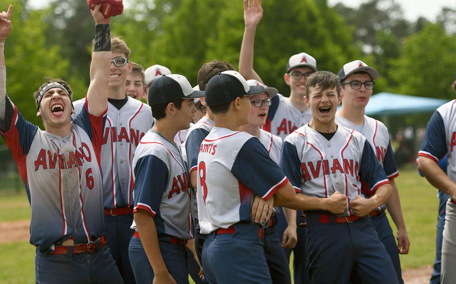 The Aviano Saints celebrate the school's first baseball champsionship after defeating the Spangdahlem Sentinels in the DODEA-Europe Division II championship game on Saturday, May 25, 2019.