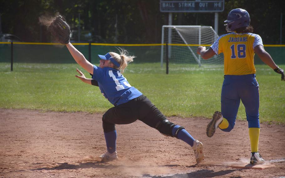 Rota's Emma Bond catches the ball as Sigonella's D'Anna Holland arrives at first in the Jaguars' 11-1 victory over the Admirals in the DODEA-Europe Division II/III title game on Saturday, May 25, 2019.