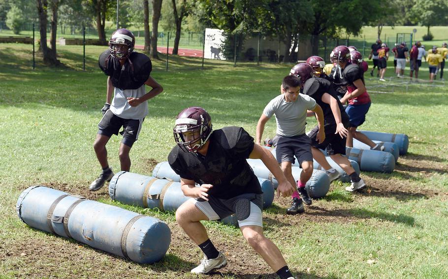 The Vilseck Falcons manuever through agility drills during practice at Vilseck, Germany, Wednesday, Aug. 21, 2019. 