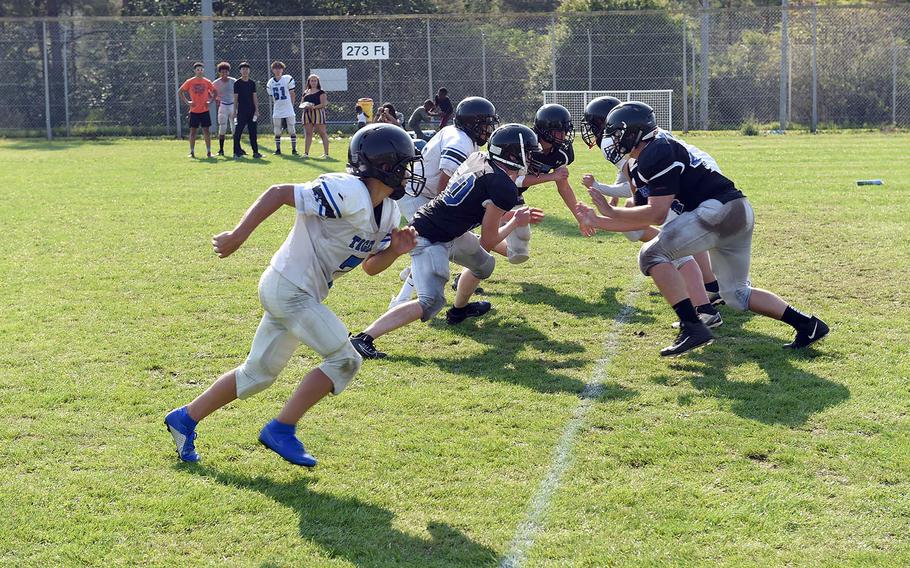 Hohenfels Tigers face each other during practice on Wednesday, Aug. 28, 2019. 