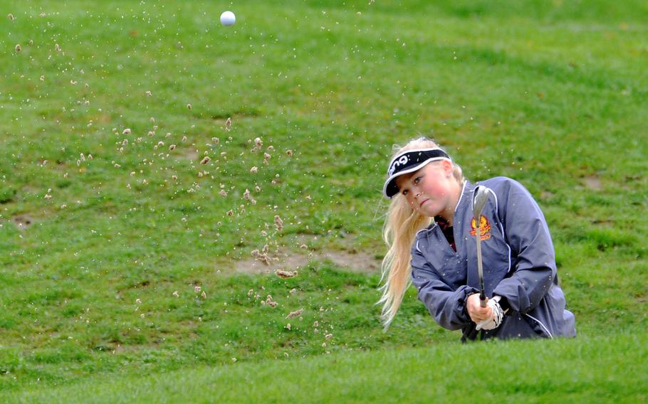 Vilseck's Anniston Fees hits out of a bunker on her way to winning the the 2019 girls DODEA-Europe golf title at Wiesbaden, Germany, Thursday, Oct. 10, 2019. She scored a modified Stableford 49 points to take the title.