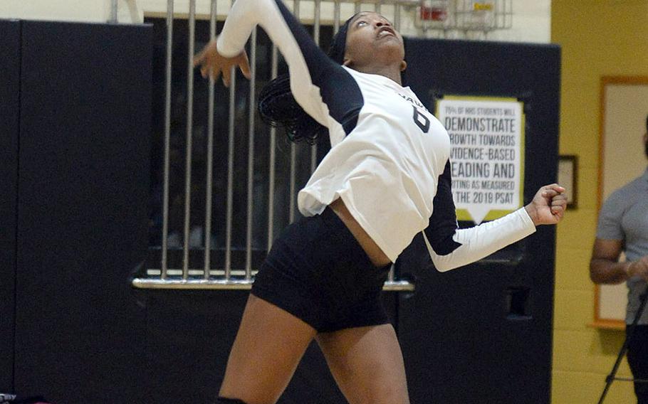 Jalynn Knight brings a jump serve to the court for host Humphreys in the Division I tournament.