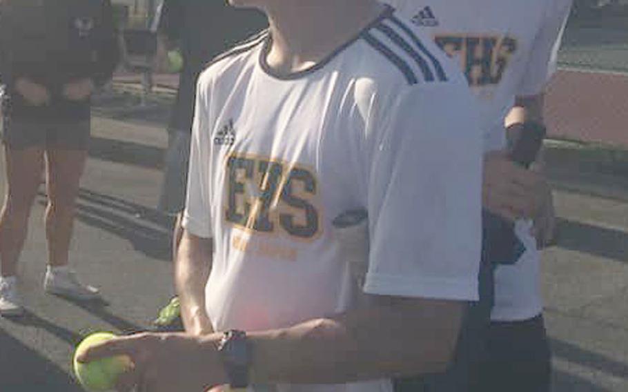 A smiling Ryken Calleros walks off the court after scoring his Far East tennis quarterfinal upset victory.