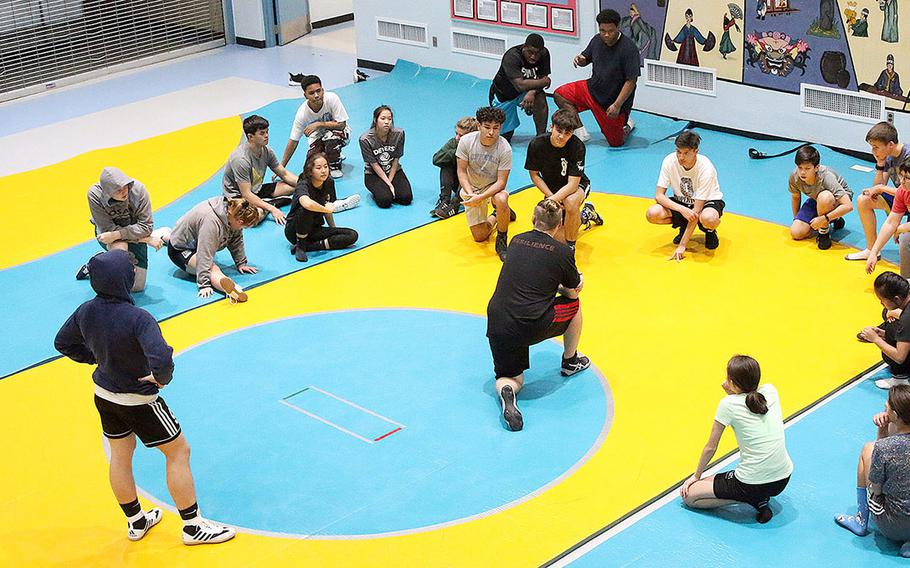 From two wrestlers two years ago and six last year, Osan's wrestling team now has as many as 26, four of them girls, pradticing in the school cafeteria daily.