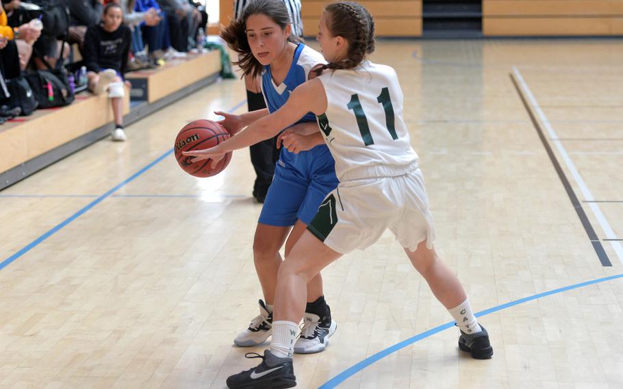 Marymount's Sofia Lopez drives against Naples' Emma Kasparek in a Division II game at the DODEA-Europe basketball championships in Wiesbaden, Germany, Wednesday, Feb. 19, 2020. Naples won 48-13.
