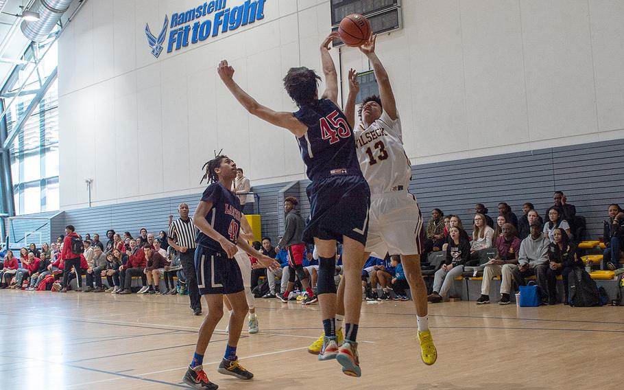 Lakenheath's Gabe Stephenson block a shot from Vilseck's Matthew Gardner during the DODEA-Europe 2020 Division I basketball playoffs at the Southside gym on Ramstein Air Base, Germany, Wednesday, Feb. 19, 2020. 