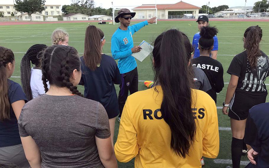 Coach Tony Washington makes his point during Saturday's Kadena girls soccer practice.