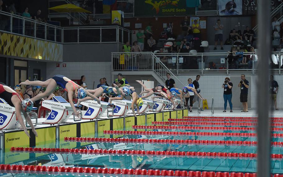 Swimmers compete in the girls 8-and-under 50-meter freestyle during the European Forces Swim League championships in Eindhoven, Netherlands, Sunday, March 1, 2020.