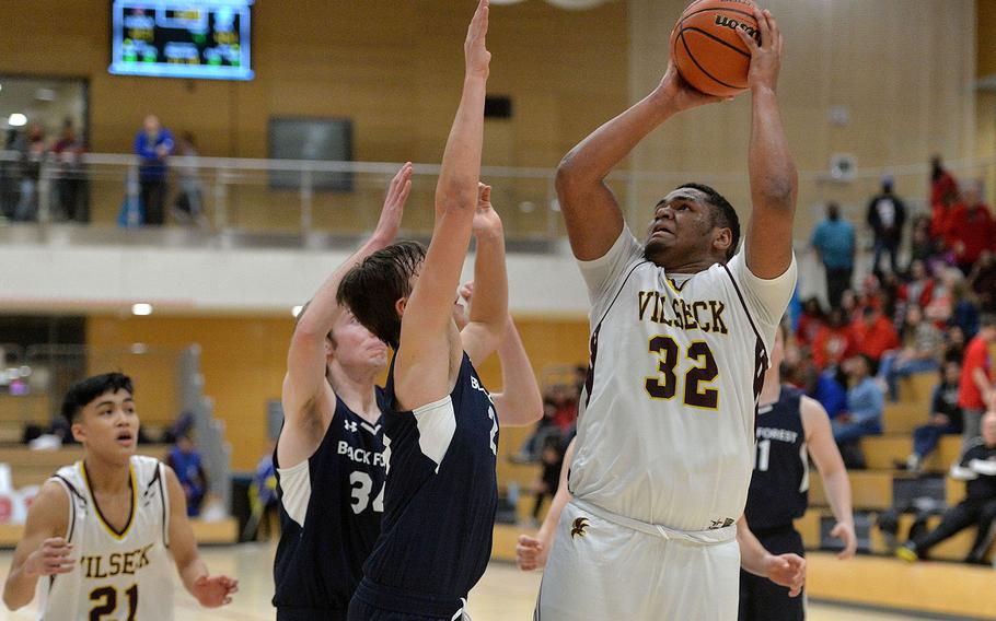 Jonas Matthews of Vilseck gets a shot off against Black Forest Academy in a boys Division I semifinal at the DODEA-Europe basketball championships in Wiesbaden, Germany, in February. Matthews was named DODEA-Europe male co-Athlete of the Year.