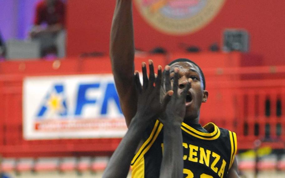 Vicenza's  Gary Donald shoots over Nigel Alexander of Naples on Friday  in a Division II quarterfinal. Naples beat Vicenza, 69-57, to advance to the semifinals later in the day.