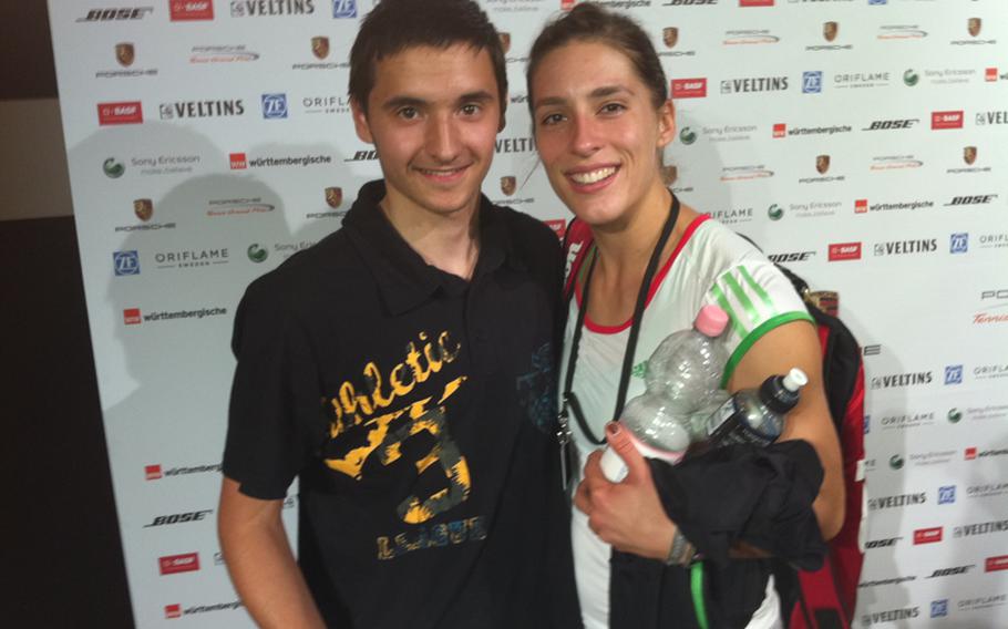 DODDS-Europe tennis champion Ajdin Tahorovic of Patch High School and German pro Andrea Petkovic get together at the recent Porsche Open tennis tournament in Stuttgart, Germany. Both players are of Bosnian descent.
  