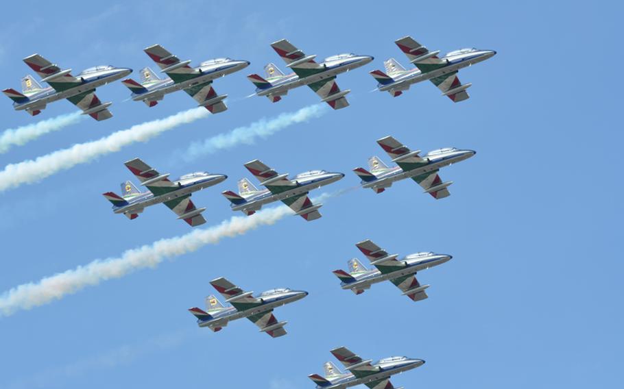 The famed Italian air acrobatic team, Frecce Tricolore, perform in an Italian air show at Jesolo this summer.