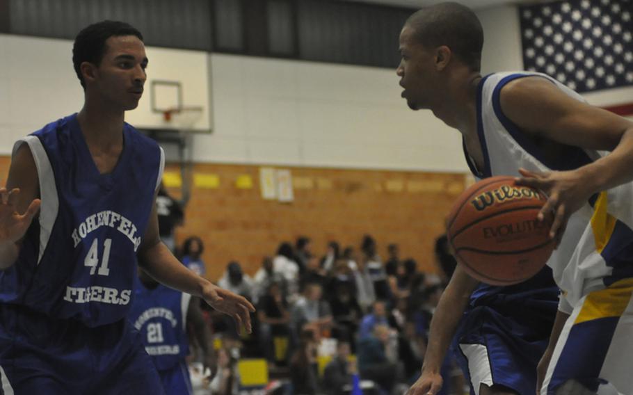 Bamberg's Terry Williams takes on Hohenfels' Xaiver Davis Friday in Bamberg. Bamberg beat Hohenfels 68-51 in the game.