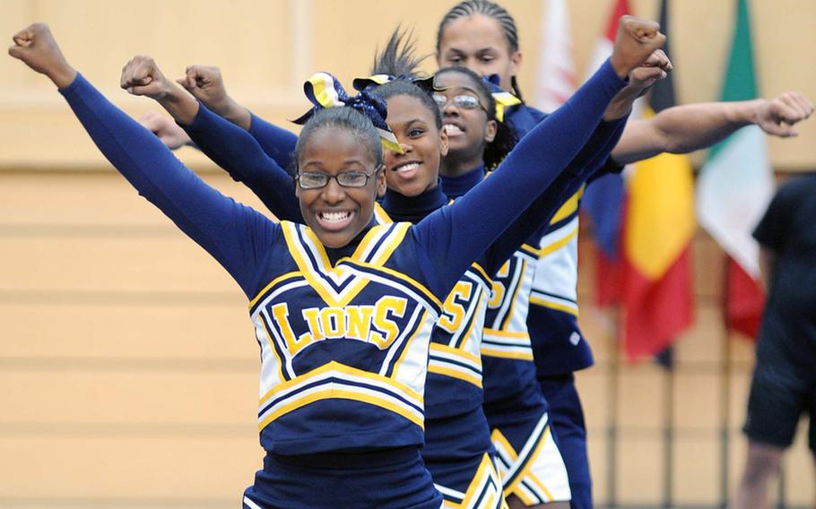 The Heidelberg Lions cheer squad perform their routine at the DODDS-Europe cheerleading championships.