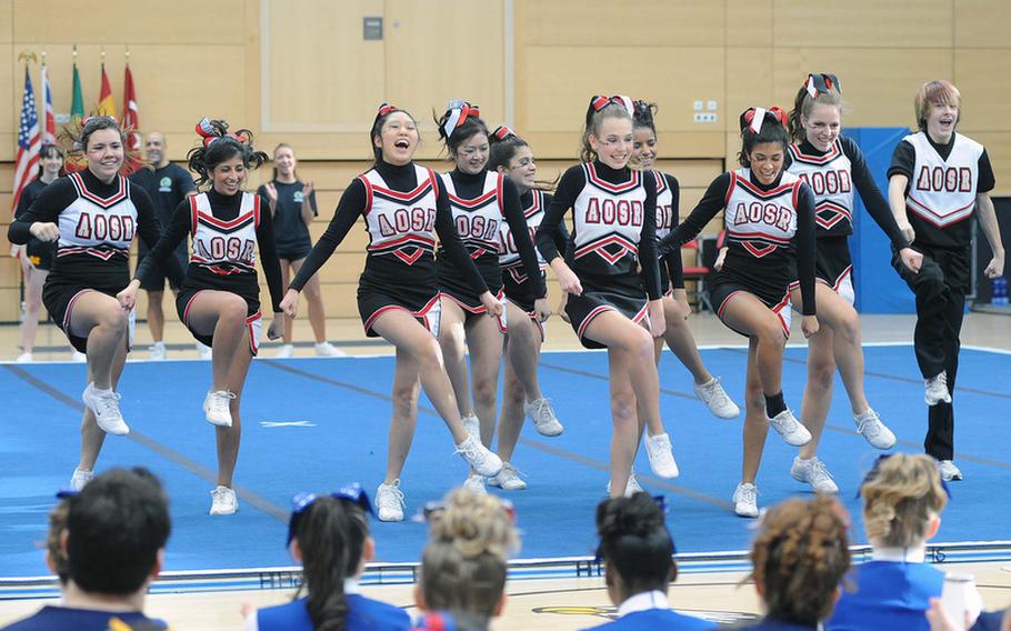 The American Overseas School of Rome cheer team dances at the DODDS-Europe cheerleading championships.
