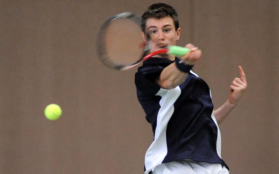 Lakenheath's Peter Kovats slams a shot over the net in his 7-5, 6-0 quarterfinal win against Conor Skelton of Naples.