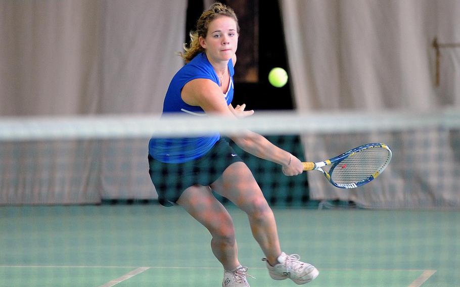 Caroline Bourgeois of Hohenfels rushes to the net to return a shot in her 6-4, 6-1 quarterfinal loss to Wiesbaden's Jade Sullivan at the DODDS-Europe tennis championships, Friday.
