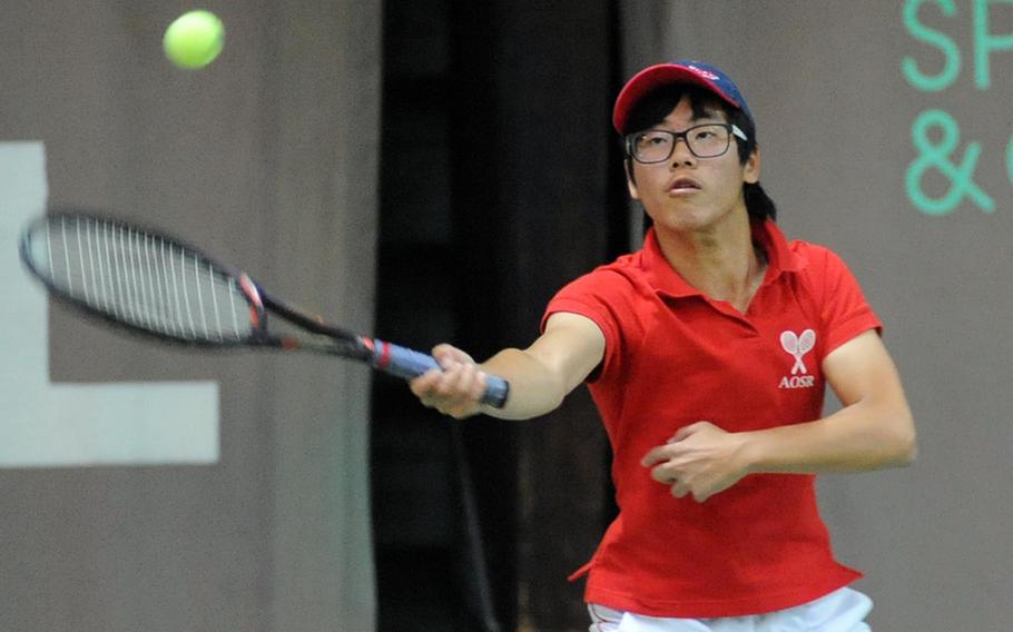 American Overseas School of Rome's Seung Won Park returns a shot in his 6-0, 6-0 quarterfinal loss to top-seeded Ajdin Tahirovic of Patch.