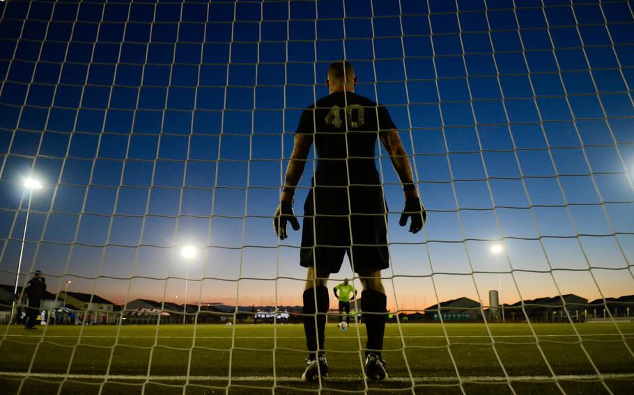 Vicenza's Shawn Durcan stands ready at the net before Ramstein's David Webster takes a penalty kick during a shootout in the U.S. Forces Europe soccer championship Oct. 28, 2012, in Wiesbaden, Germany.
