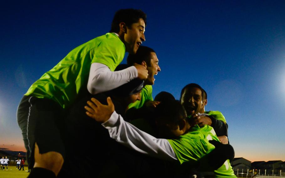 Ramstein players celebrate after winning the U.S. Forces Europe soccer championship with an overtime and a shootout Oct. 28, 2012, in Wiesbaden, Germany.

