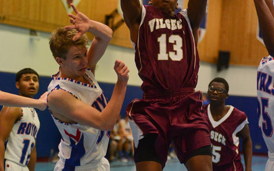 Vilseck High School's Carlton Campbell takes a short jumper Friday night at Ramstein Air base as his team lost to Ramstein High School.
