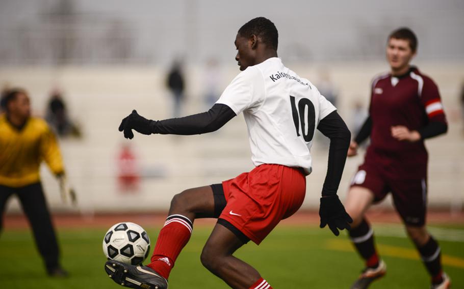 Kaiserslautern's Stephen Adjei gains control of the ball Saturday afternoon as his team defeated visiting Vilseck 4-1 at Vogelweh, Germany.