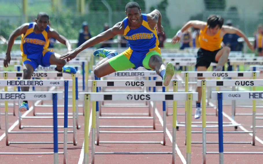 Wiesbaden's Remoi Jno-Lewis, center, won the 110-meter hurdle race Saturday in Heidelberg in 15.52 seconds ahead of teammates Anthony Sterling and Jeremy Colon-Rios. It was the final track meet hosted by Heidelberg High School.
