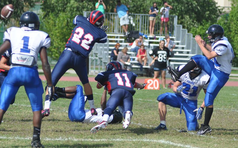 Aviano's Daniel Dinges and Ryan Perran attempted to block a field goal by Hohenfels during a game Saturday at Aviano Air Base, Italy. Hohenfels won 41-22.