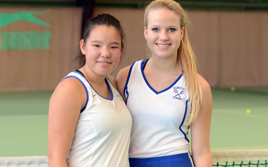 Ramstein's Jennifer Debose, left, and Hannah Hering took the girls doubles title at the 2013 DODDS-Europe tennis championships defeating Wiesbaden's Peyton Taylor and Kate Connors 6-4, 3-6, 6-3.