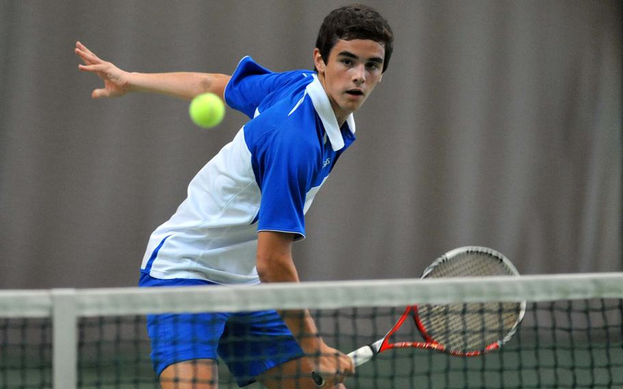 Marymount's Matteo Ciccozzi watches his ball sail over the net in the boys doubles final at the DODDS-Europe tennis championships, Saturday, Oct. 26, 2013. Ciccozzi and teammate Ting Lin took the title, beating AFNORTH's Luke Bonenclark and Saverio Yount 6-4, 6-1.