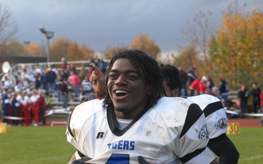 Hohenfels sophomore Jeantony Saintmelus celebrates after Hohenfels' 38-28 Division II semifinal win Saturday, Oct. 26, at Bitburg, Germany. 