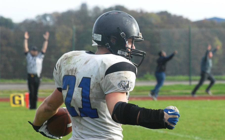 Hohenfels running back David Vidovic celebrates his fourth-quarter go-ahead touchdown run in Hohenfels' 38-28 Division II semifinal win Saturday, Oct. 26, at Bitburg, Germany.