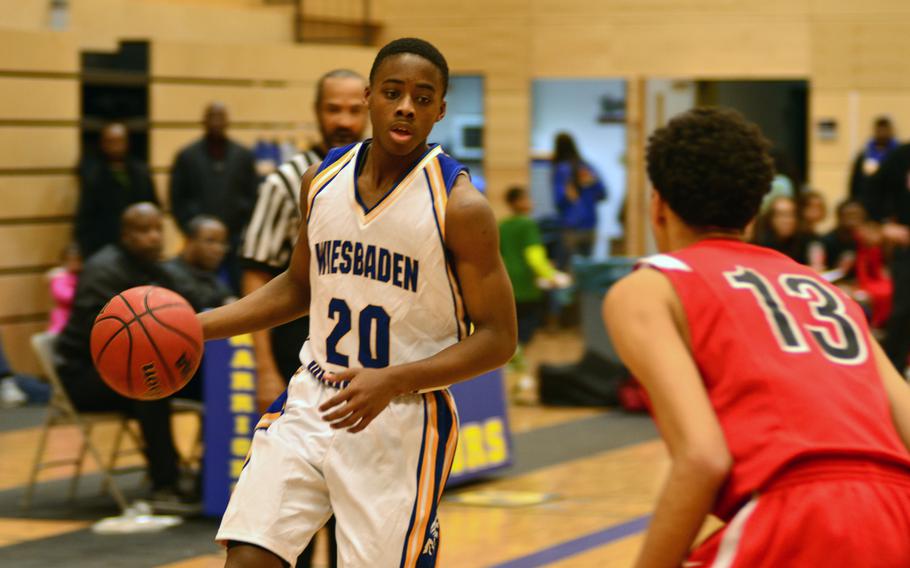 Wiesbaden's Darren Williams attempts to drive the ball past Kaiserslautern's Emilio Moreno on Saturday. Wiesbaden held on to win the game 78-70.