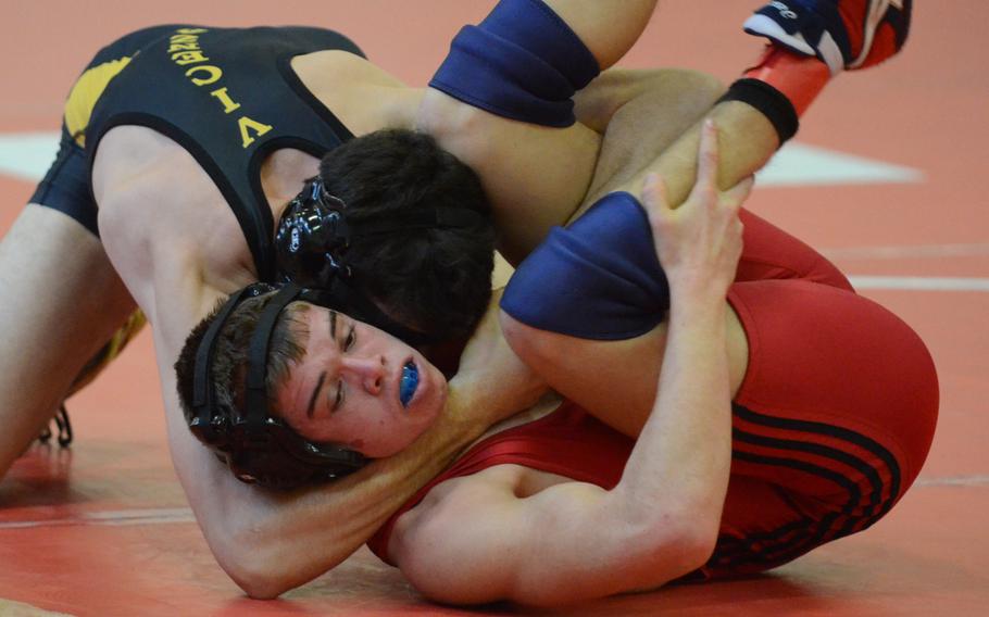 Vicenza's Marshall Perfetti pins Aviano's Daniel Dinges in 1:17 Saturday, during a 160-pound wrestling match at Aviano Air Base, Italy. Perfetti took first in the weight class followed by Dinges in second.