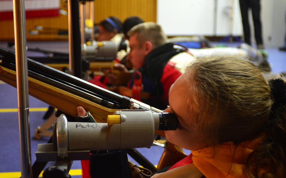 Patch's Erika Hoffman used a monocular to check her aiming while in the prone position at a DODDS-Europe marksmanship competition Saturday in Wiesbaden, Germany.