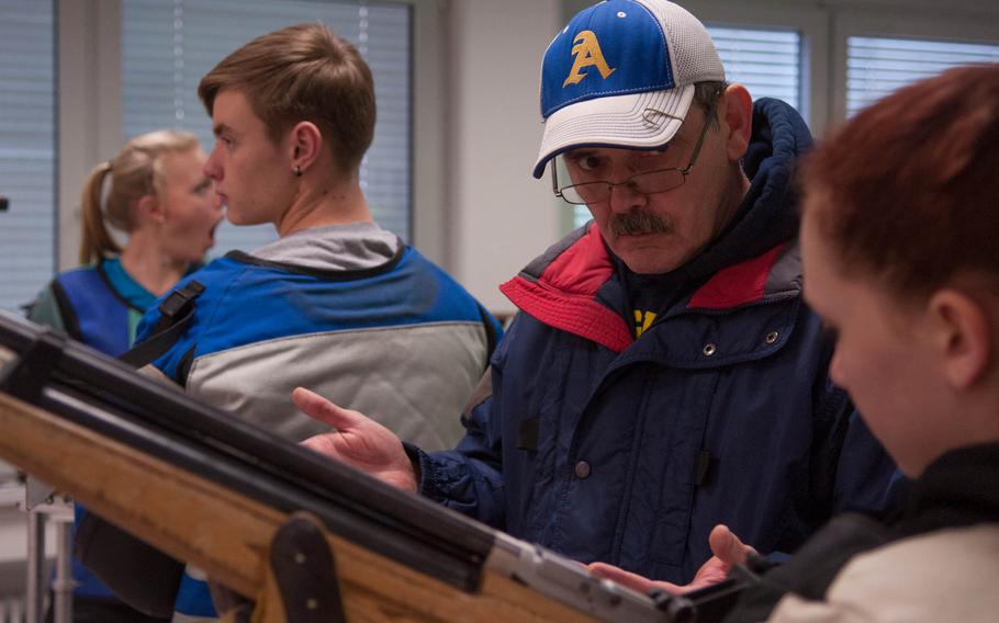 Ansbach rifle coach Randy Dolph offers some last minute pointers for shooter Hanna Eckert Saturday, during an Eastern Conference DODDS-Europe marksmanship match at Vilseck, Germany.