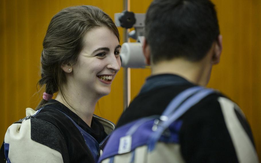 Hohenfels' Michelle Willey and Mason Saldana share a smile in the DODDS-Europe Marksmanship Championship Saturday, Feb. 1, 2014 at Wiesbaden, Germany.