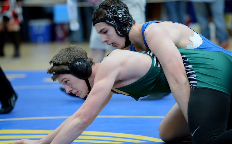 Incirlik's Eli Spencer, right, defeated Josh Hensy of Naples in their 182-pound match in first round action on the first day of the DODDS-Europe wrestling championships in Wiesbaden, Germany, Friday, Feb. 14, 2014.